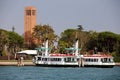 Commuter boats CANALETTO and GIORGIONE moored at Sant`Elena island and part of Venice