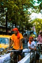 A commuter carrying luggage in a rickshaw