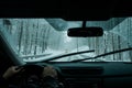 A commuter driving in a winter snow storm Royalty Free Stock Photo