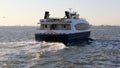 Commuter ferry boat OPPORTUNITY leaving Brooklyn Army Terminal pier, rear view, New York, NY