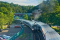 Commuter trains passing on curve Royalty Free Stock Photo