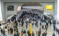 Commuters at a busy train station in Japan