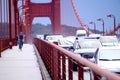 Commuters crossing the Golden Gate Bridge during rush hour.