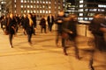 Commuters on London Bridge at night Royalty Free Stock Photo