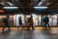 Commuters in Motion at Subway Station Royalty Free Stock Photo