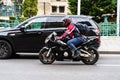 Commuters and office workers on motorcycle during rush hour traffic.  Traffic in downtown Bucharest, Romania, 2020 Royalty Free Stock Photo