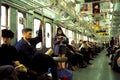 Commuters on Subway in Tokyo Royalty Free Stock Photo