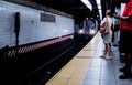 Commuters waiting for 6 train inside Grand Central Station