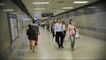 Commuters Walk through Underground Train Station Royalty Free Stock Photo