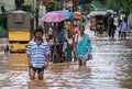 Commuters on a waterlogged road after heavy rainfall, on October 6, 2023 in Guwahati, Assam, India. Severe water logging witnessed