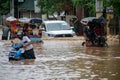 Commuters on a waterlogged road after heavy rainfall, on October 6, 2023 in Guwahati, Assam, India. Severe water logging witnessed