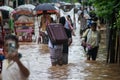 Commuters on a waterlogged road after heavy rainfall, on October 6, 2023 in Guwahati, Assam, India. Severe water logging witnessed