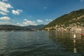 Como, ITALY - August 4, 2019: Apartments, villas, hotels on the green forested mountainsides near Lake Como. Beautiful Italian Royalty Free Stock Photo