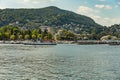 Como, ITALY - August 4, 2019: Apartments, villas, hotels on the green forested mountainsides near Lake Como. Beautiful Italian Royalty Free Stock Photo