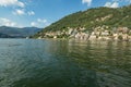 Como, ITALY - August 4, 2019: Apartments, villas, hotels on the green forested mountainsides near Lake Como. Beautiful Italian Royalty Free Stock Photo