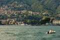 Como, ITALY - August 4, 2019: Apartments, villas, hotels on the green forested mountainsides near Lake Como. Beautiful Italian Royalty Free Stock Photo