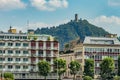 Como, ITALY - August 4, 2019: Apartments, villas, hotels near Lake Como. Beautiful Italian Como city. Baradello Castle on the Royalty Free Stock Photo