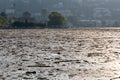 Como Italy the lake covered with timber and debris after heavy rains