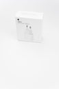 Apple brand 20W USB-C power adapter box isolated on a white background