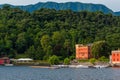 Como lake with colorful Villa in the forest and boats in Lenno comune, Lombardy, Italy. Italian landscape. Popular