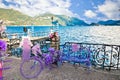 Como Lake. Romantic lavender view of Como lake from Menaggio waterfront walkway Royalty Free Stock Photo