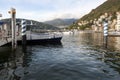 COMO, LOMBARDY, ITALY, November 06, 2019, Local pier for public navigation in a bay of Como city on Lake Como, Northern