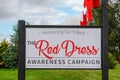 Comox Valley~Vancouver Island, BC, Canada, Sept 30 2017. The Red Dress Awareness Campaign & Installation at Simms Millennium Park