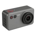 Compact action camera with built-in lens and recording button Royalty Free Stock Photo