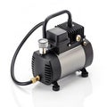 Compact Airbrush Compressor with Handle and Hose on White Background air compressor portable Royalty Free Stock Photo