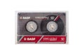 Compact audio cassette BASF isolated. Back view compact audio cassette BASF FERRO EXTRA 90 in transparent case box. Position IEC t