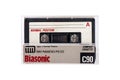 Compact audio cassette BIASONIC isolated. Back view compact audio cassette BIASONIC C90 in transparent case box