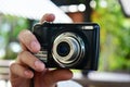 A compact black digital camera that still captures beautiful and sharp images Royalty Free Stock Photo