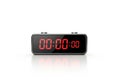Small black digital timer with red led display showing zero time isolated on white background Royalty Free Stock Photo