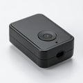 Sleek Black Portable Tech Gadget on a White Background Royalty Free Stock Photo