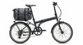 A compact, black folding bicycle featuring a lightweight frame and thin tires. It Royalty Free Stock Photo