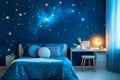 Compact boys room designed with a space theme featuring galaxy bedding and ambient blue lighting for a cozy environment Royalty Free Stock Photo