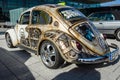 Compact car Volkswagen Beetle in unusual body painting aerography.