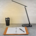 Compact desk lamp with a coffee cup and notepad with RGB color backlighting and soft light. Royalty Free Stock Photo