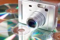 Compact digital camera and cd Royalty Free Stock Photo