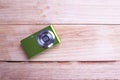 Compact Digital Camera isolated on wooden Background Royalty Free Stock Photo