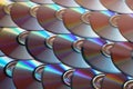 Compact discs background. Several cd dvd blu-ray discs. Optical recordable or rewritable digital data storage. Royalty Free Stock Photo