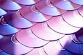 Compact discs background. Several cd dvd blu-ray discs. Optical recordable or rewritable digital data storage. Royalty Free Stock Photo
