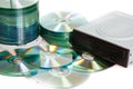 Compact discs and burner on a white background Royalty Free Stock Photo