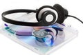 Compact Discs (CDs) with headphones Royalty Free Stock Photo