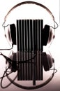Compact discs plugged-in into headphones Royalty Free Stock Photo