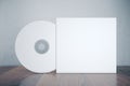 Compact disk with cover Royalty Free Stock Photo