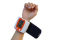 A compact and easy-to-carry wrist-type sphygmomanometer. Blood Pressure Monitors on human small wrist of thin people.