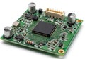 Compact electronic circuit board with microcontroller and capacitors for embedded systems applications Royalty Free Stock Photo