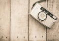 Compact film camera on wood Royalty Free Stock Photo