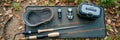 Compact fishing kit with rods, reels, and tools for outdoor adventures Royalty Free Stock Photo